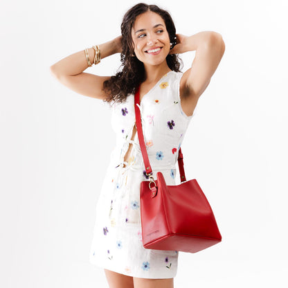 Ruby | symmetrical bucket bag with latch closure and removable crossbody strap
