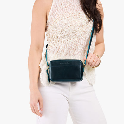 Boreal*Small | Model wearing petite rectangular crossbody with adjustable strap