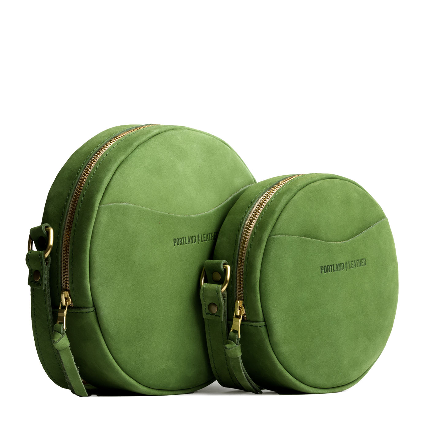 Succulent | Size comparison image of small and large circle shaped crossbody bags with top zipper