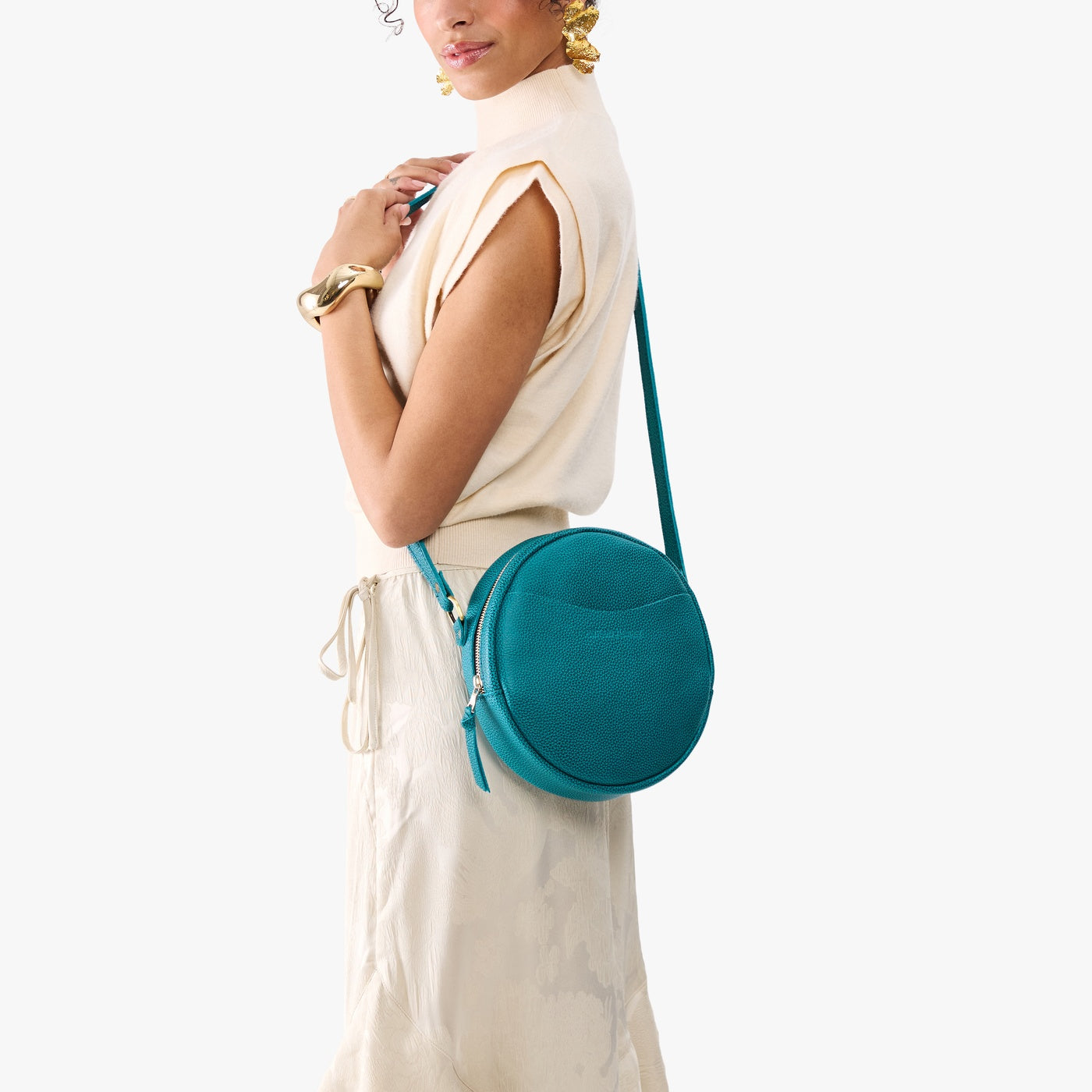Aquarius*Large | Model wearing circle shaped crossbody bag with top zipper