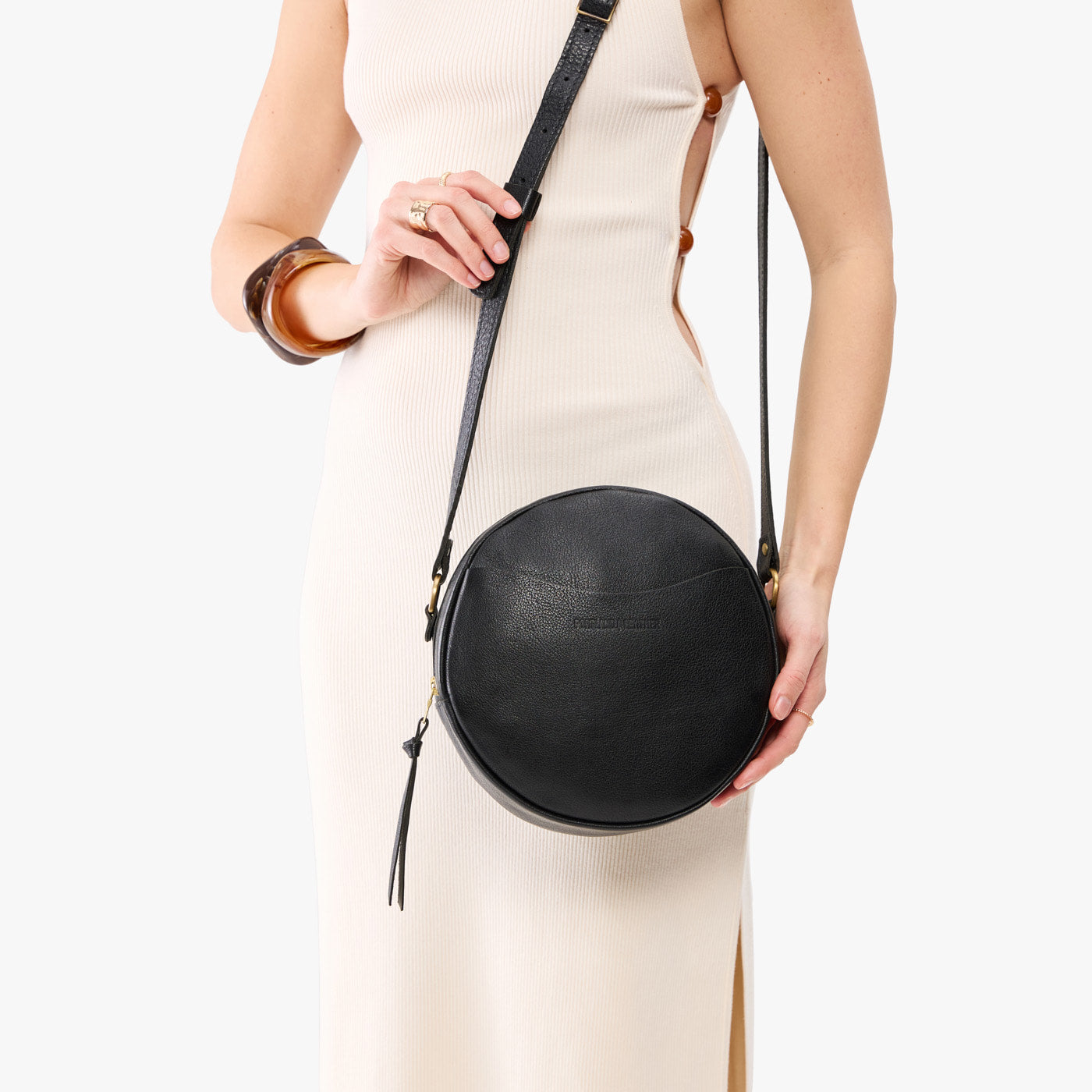 Pebbled--black*Large | Circle shaped crossbody bag with top zipper