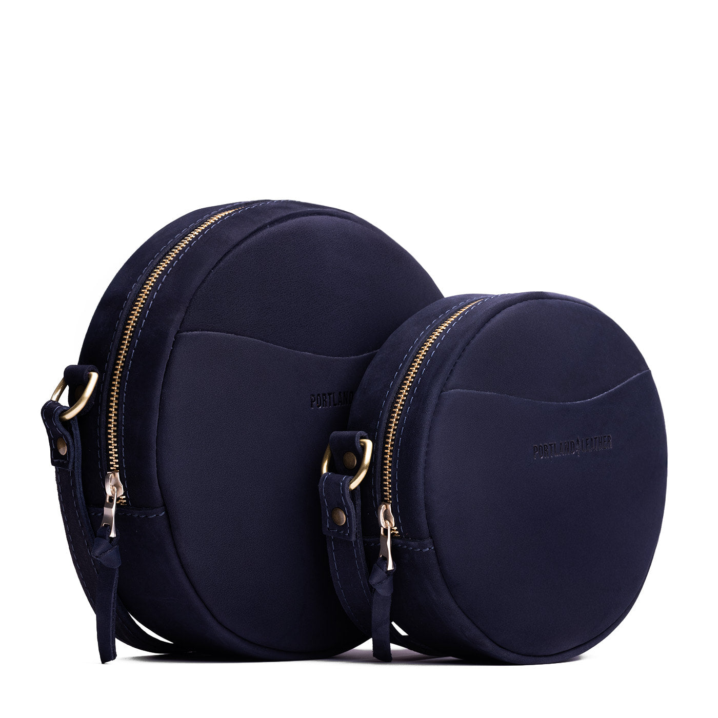 Velvet Blue | Size comparison image of small and large circle shaped crossbody bags with top zipper