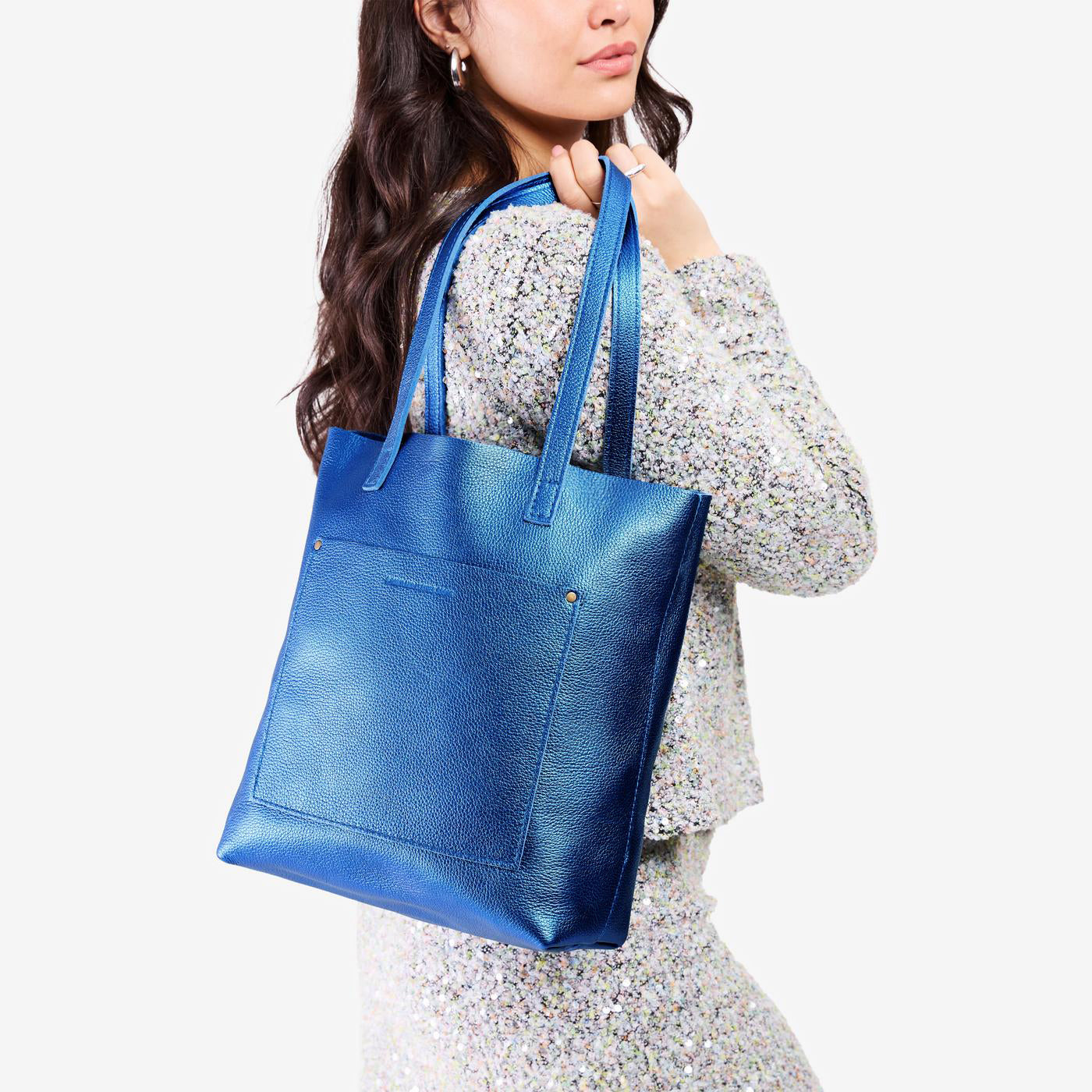 Comet Blue*Classic | Model holding medium Tote with dual shoulder straps and crossbody strap