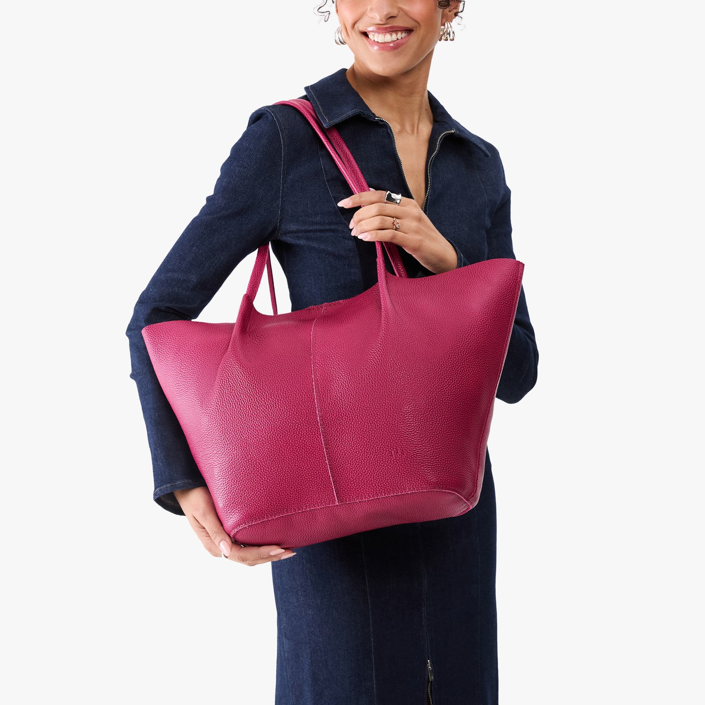 Cosmo*Oversized | Model holding extra wide bucket shaped tote bag with matching leather handles