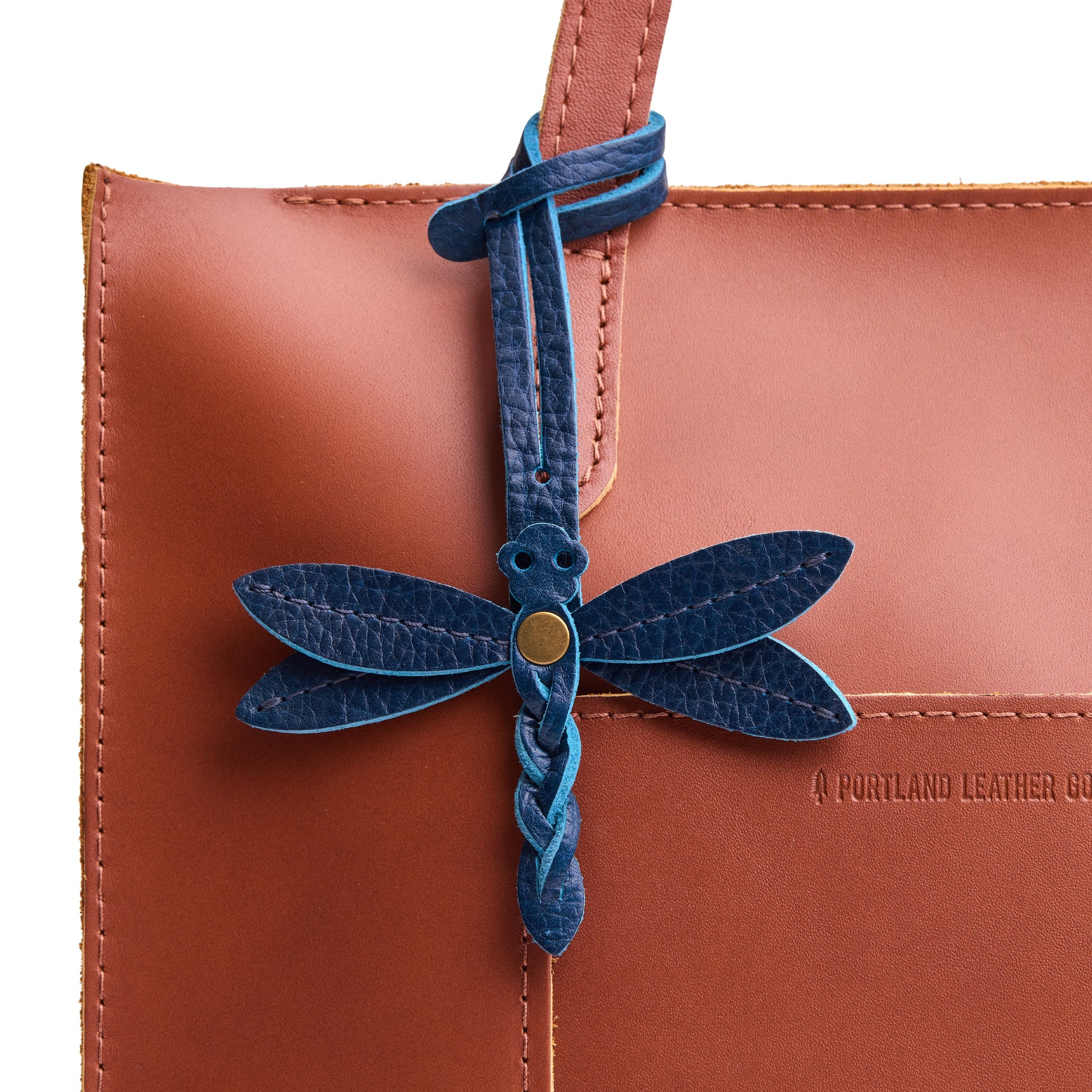 Caspian | Dragonfly shaped leather charm tassel on bag