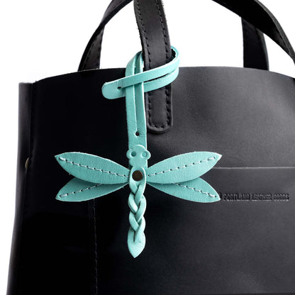 Optical | Dragonfly shaped leather charm tassel