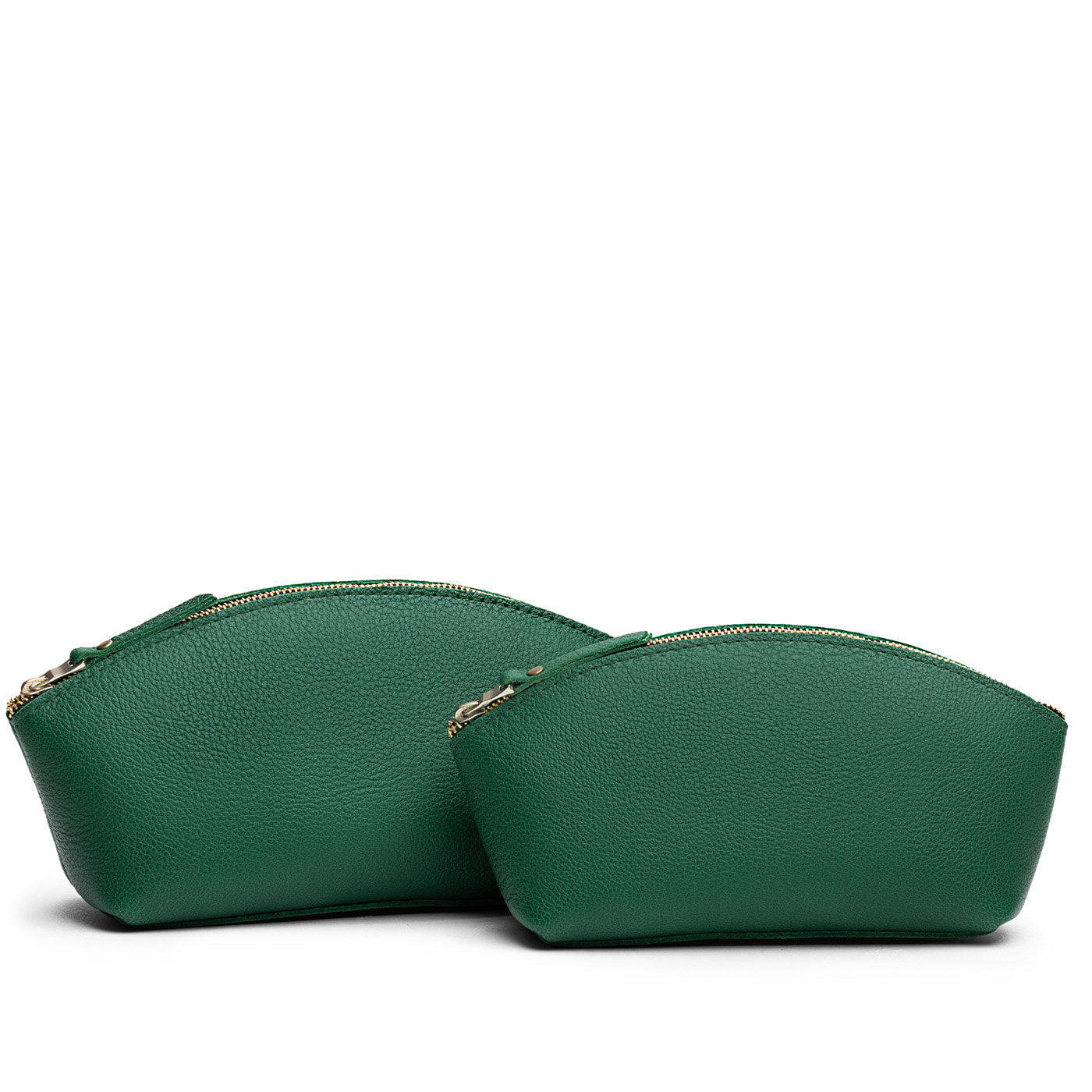 Bacalar | Size comparison shot of two spacious leather makeup bags with curved seams and top zipper