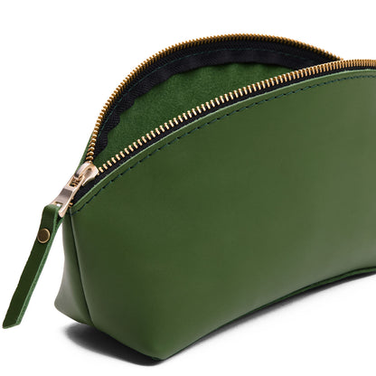 Cactus | Close-up of spacious leather makeup bag with curved seams and top zipper