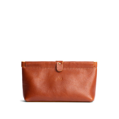 Sienna | Leather pouch with frame top closure and leather pull tab