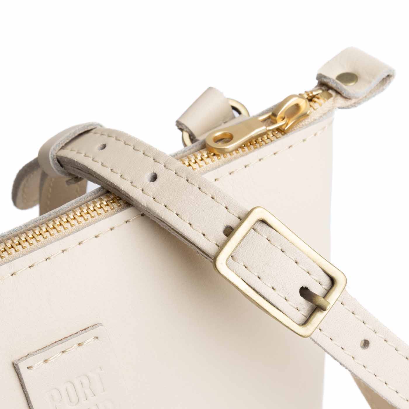 Bone | Small rectangular crossbody purse with top zipper and interior pocket