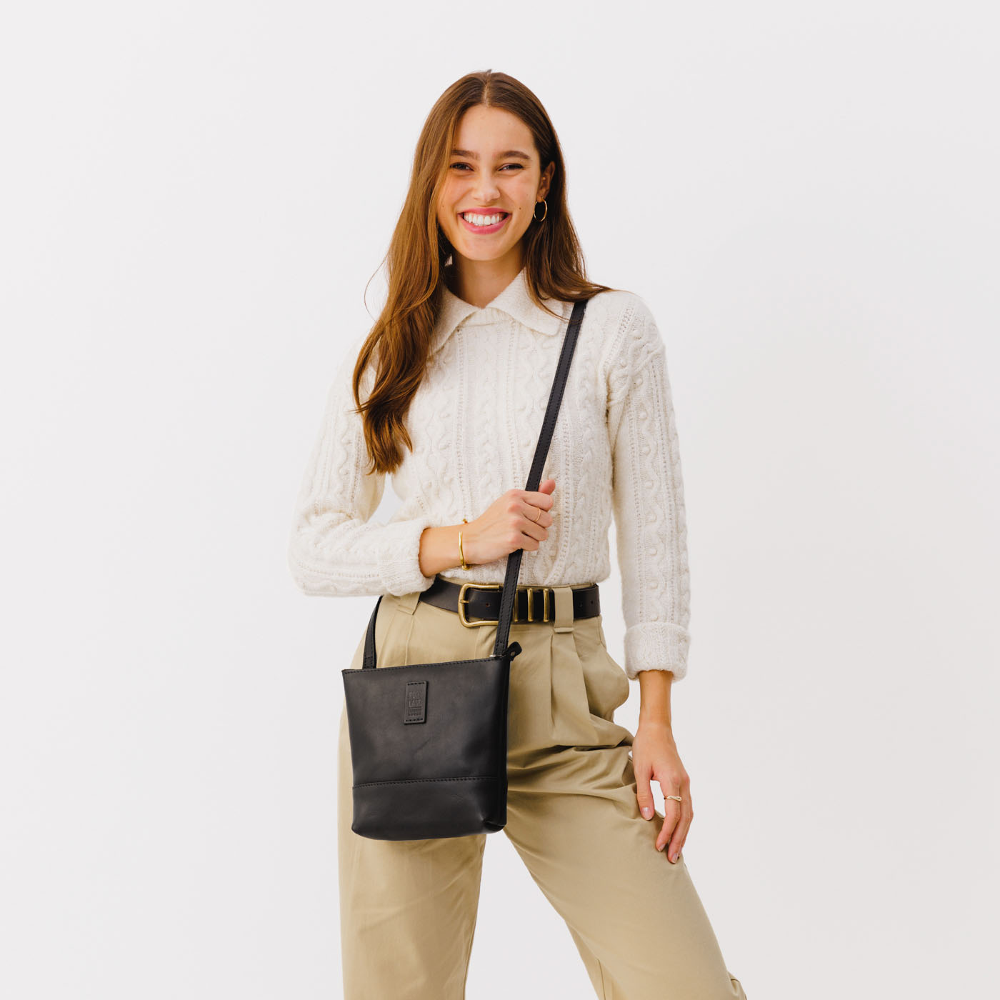 Black | Small rectangular crossbody purse with top zipper and interior pocket