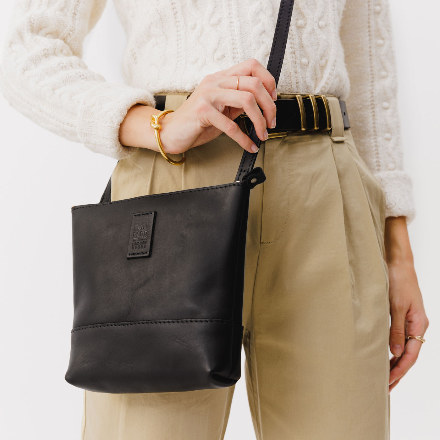 Black | Small rectangular crossbody purse with top zipper and interior pocket