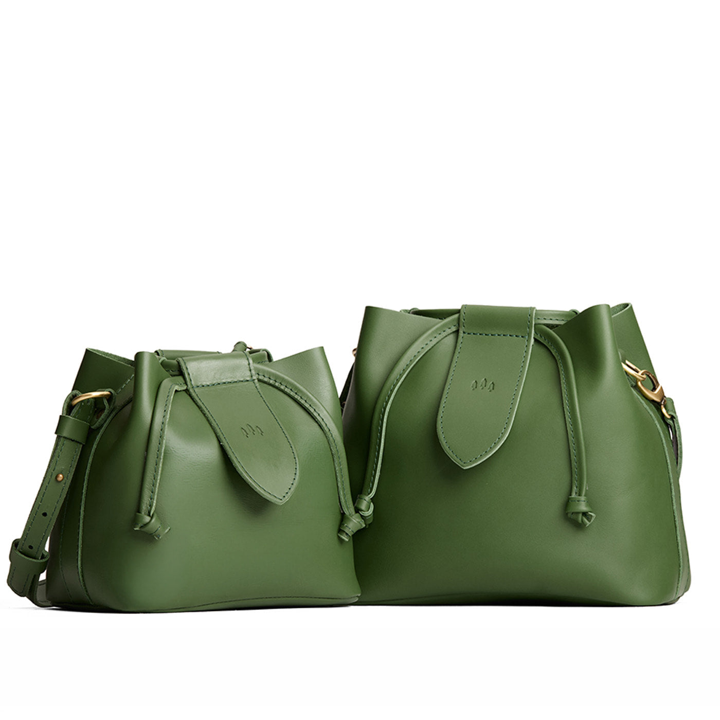 Cactus | Small and large symmetrical leather bags with leather drawstring closure and adjustable shoulder strap