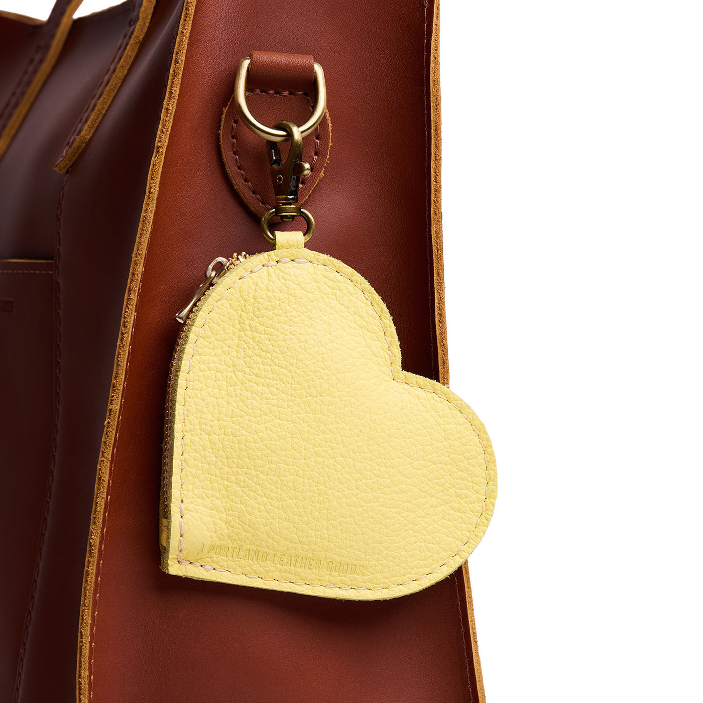 Butter Bliss | Heart-shaped leather pouch keychain with zipper top and lobster clasp