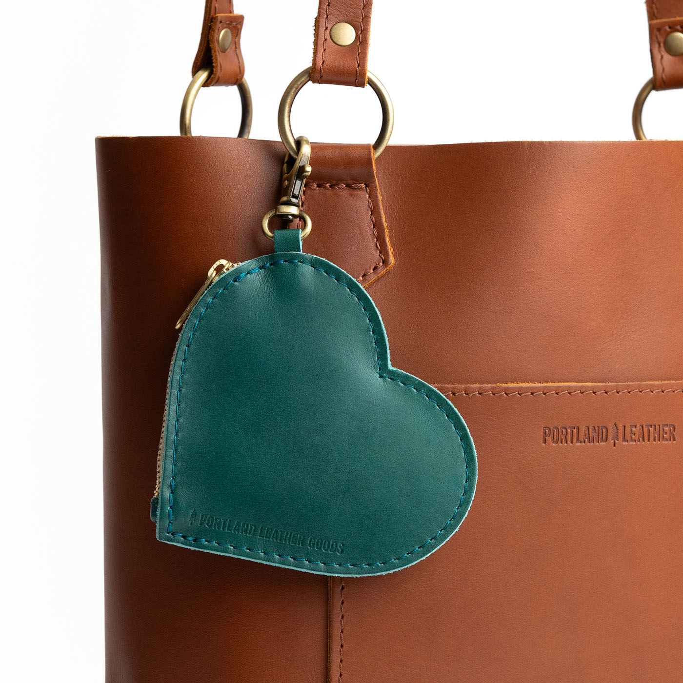 Caribbean | Heart-shaped leather pouch keychain with zipper top and lobster clasp