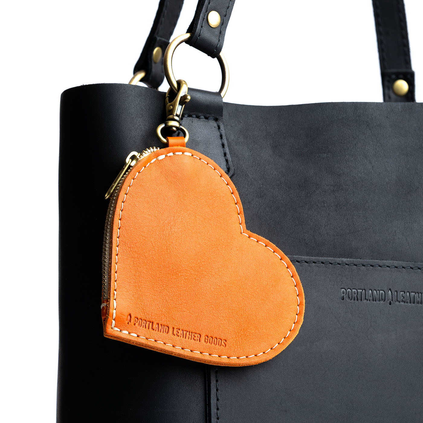 Clementine | Heart-shaped leather pouch keychain with zipper top and lobster clasp