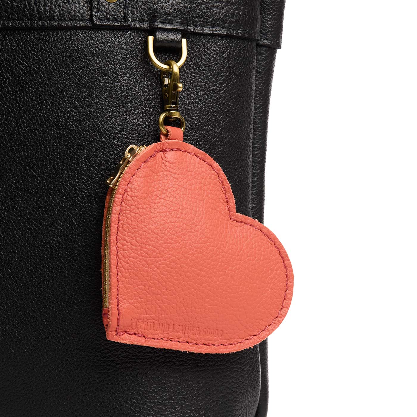 Coral | Heart-shaped leather pouch keychain with zipper top and lobster clasp