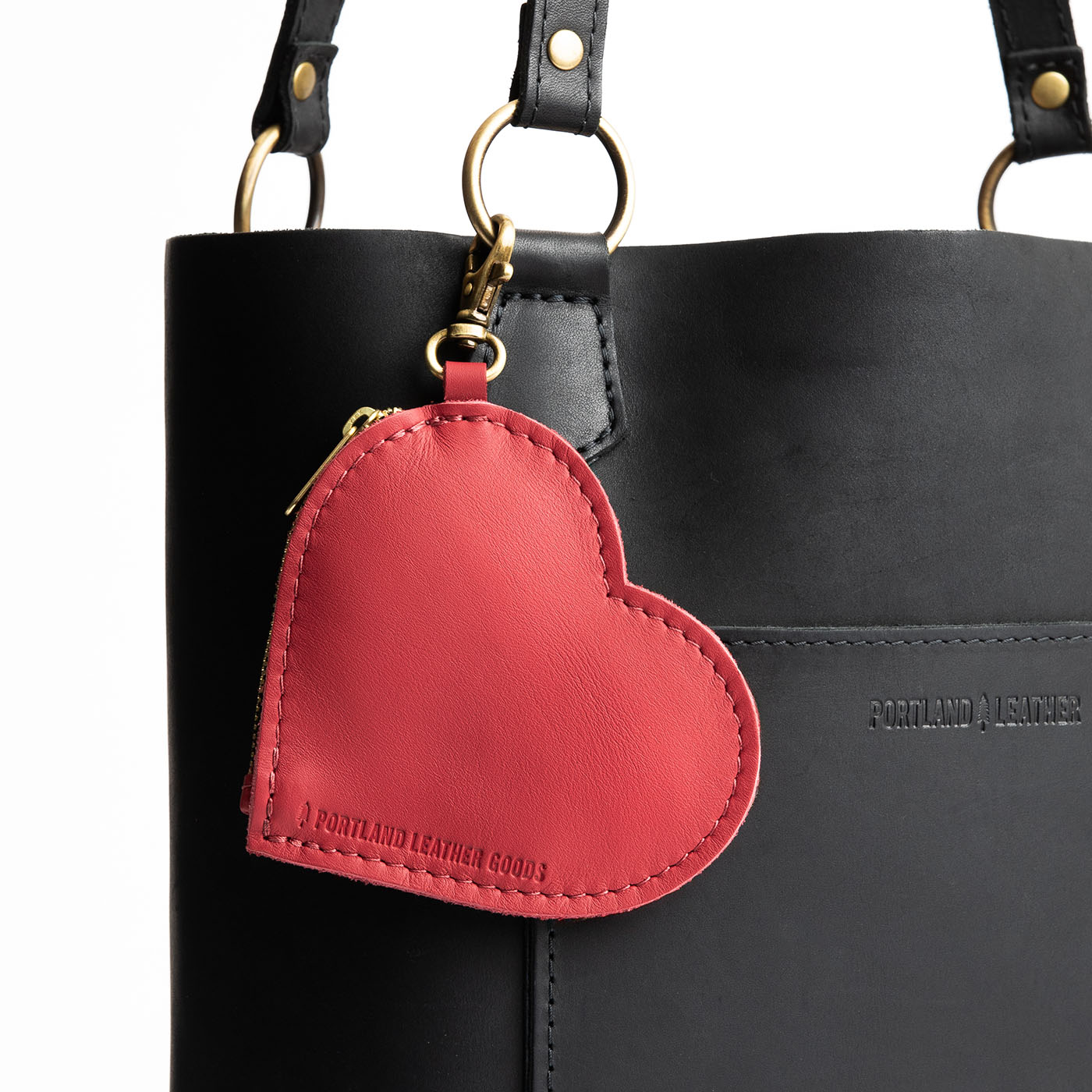 Crimson | Heart-shaped leather pouch keychain with zipper top and lobster clasp