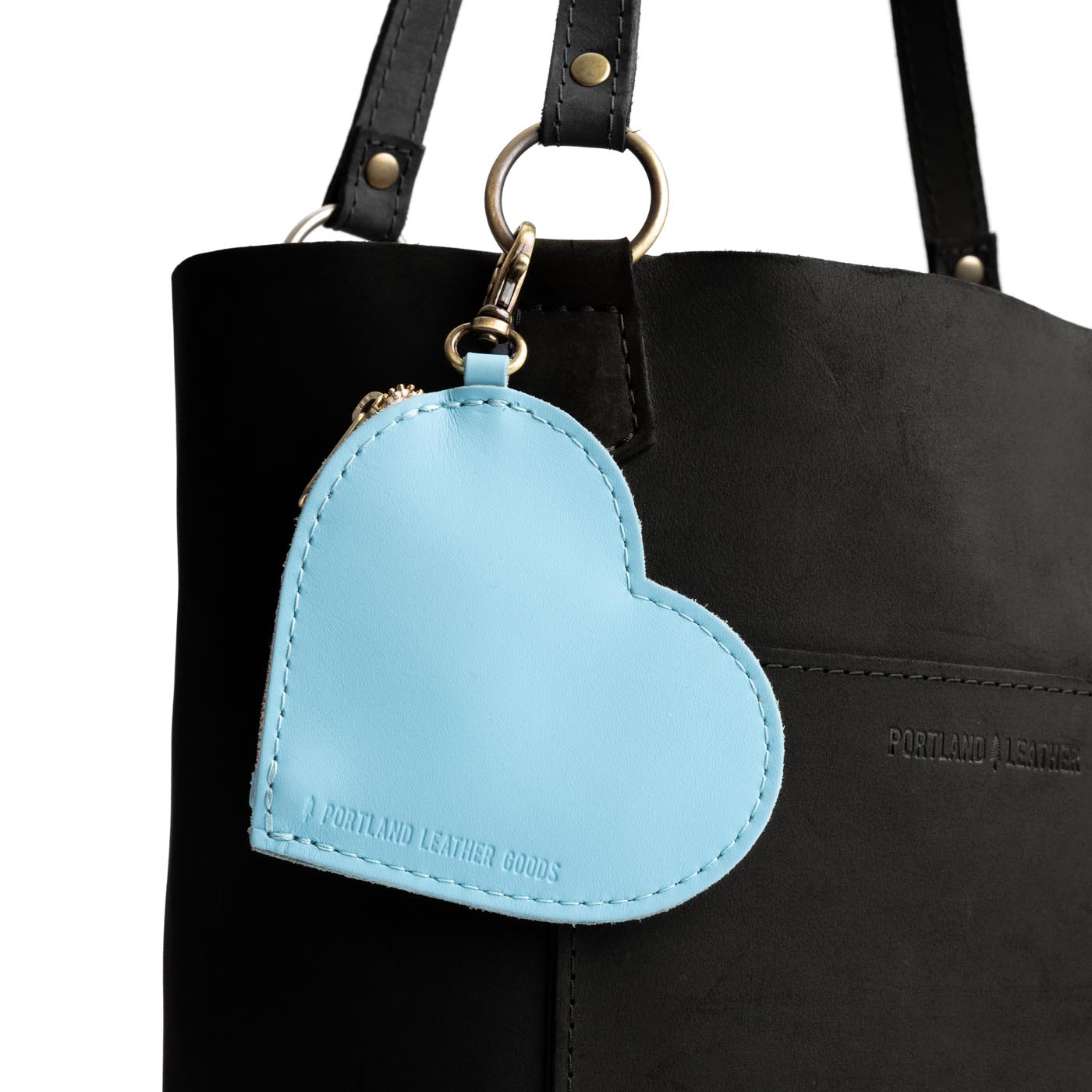 Glacial Blue | Heart-shaped leather pouch keychain with zipper top and lobster clasp