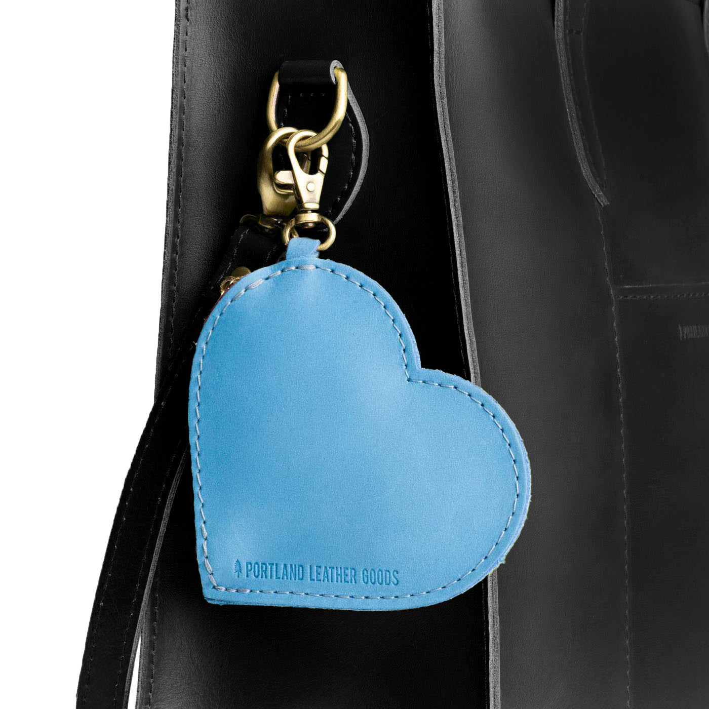 Iceberg Blue | Heart-shaped leather pouch keychain with zipper top and lobster clasp