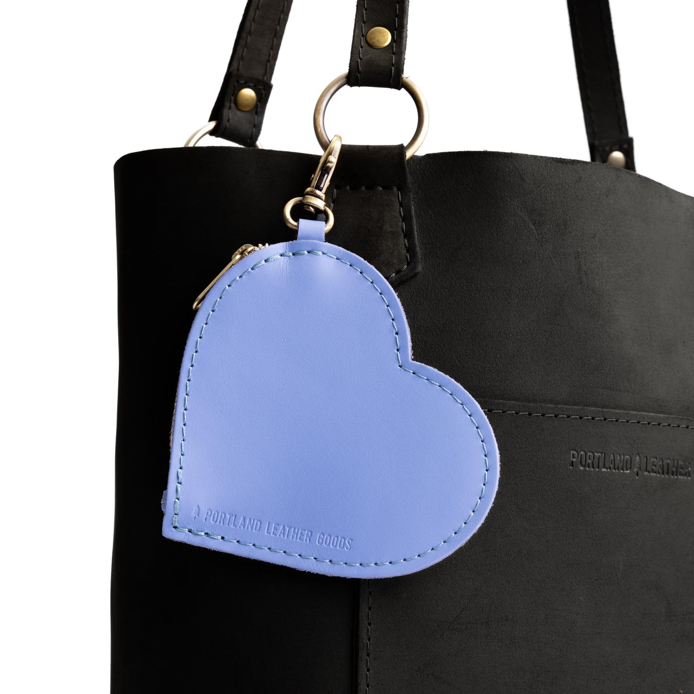 Jacaranda | Heart-shaped leather pouch keychain with zipper top and lobster clasp