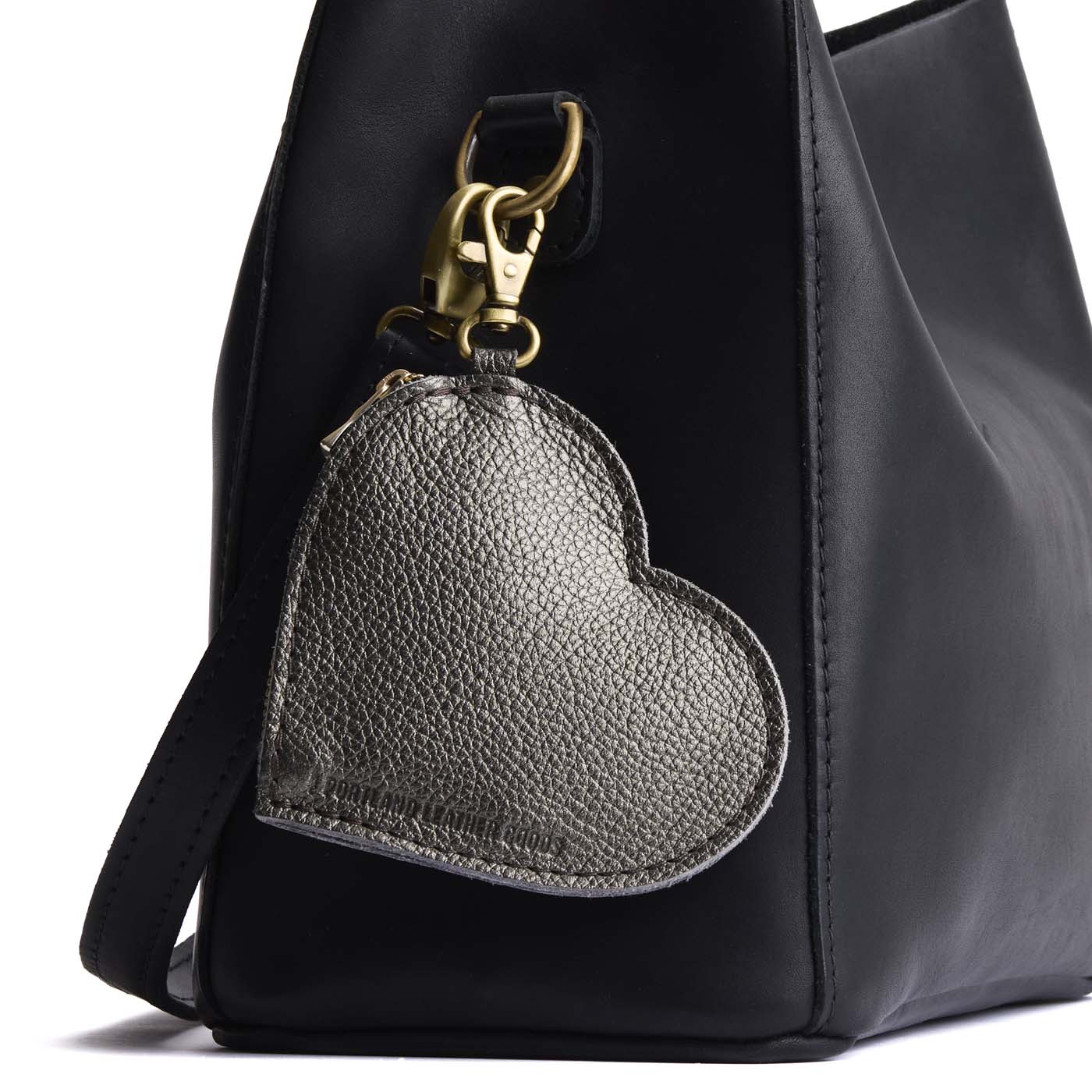 Stardust | Heart-shaped leather pouch keychain with zipper top and lobster clasp