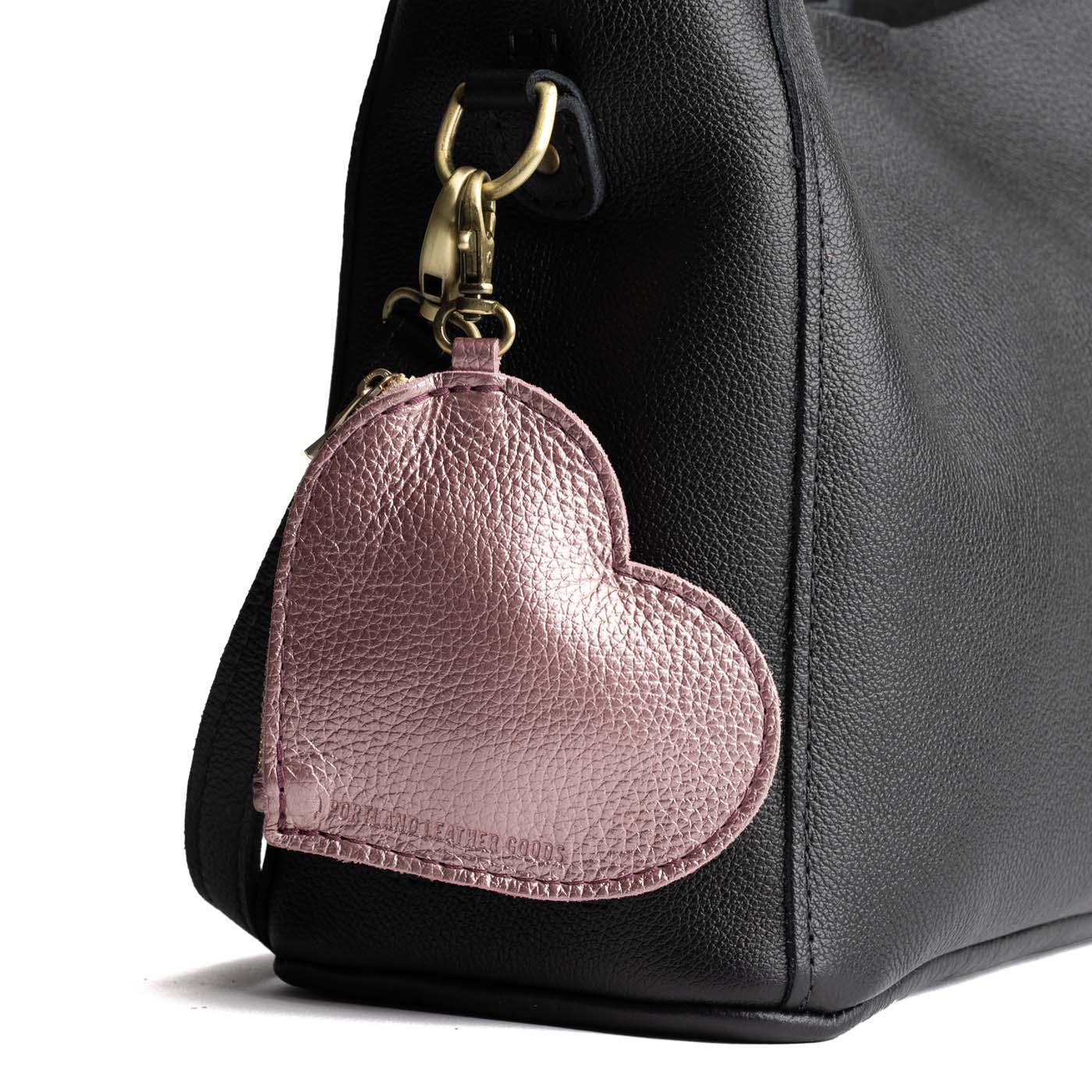 Supernova | Heart-shaped leather pouch keychain with zipper top and lobster clasp
