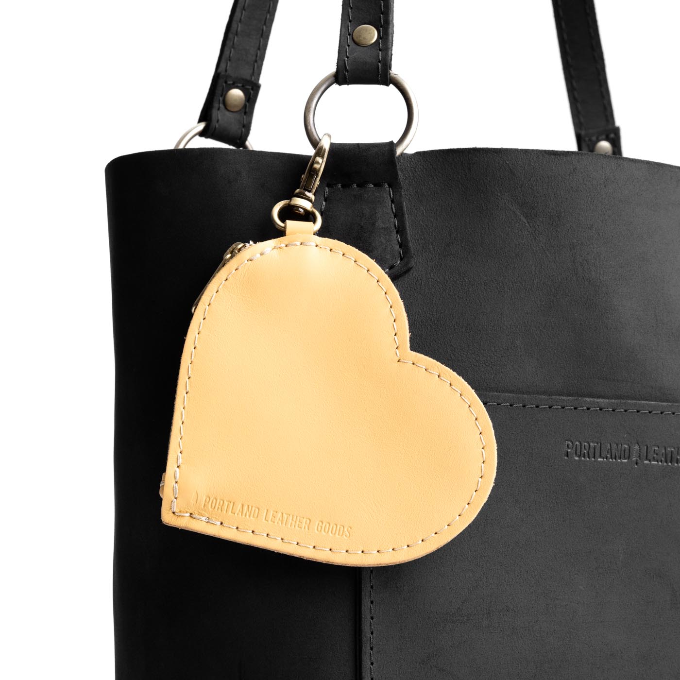 Vanilla | Heart-shaped leather pouch keychain with zipper top and lobster clasp