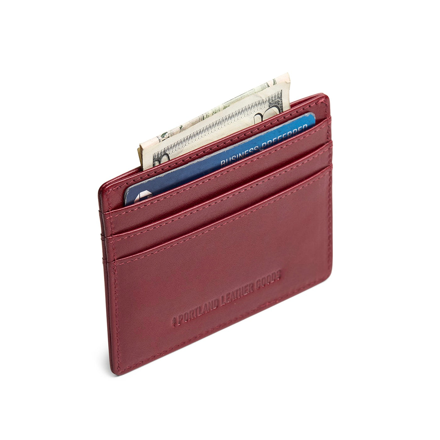Red Rock*Deluxe | Leather card holder on white background