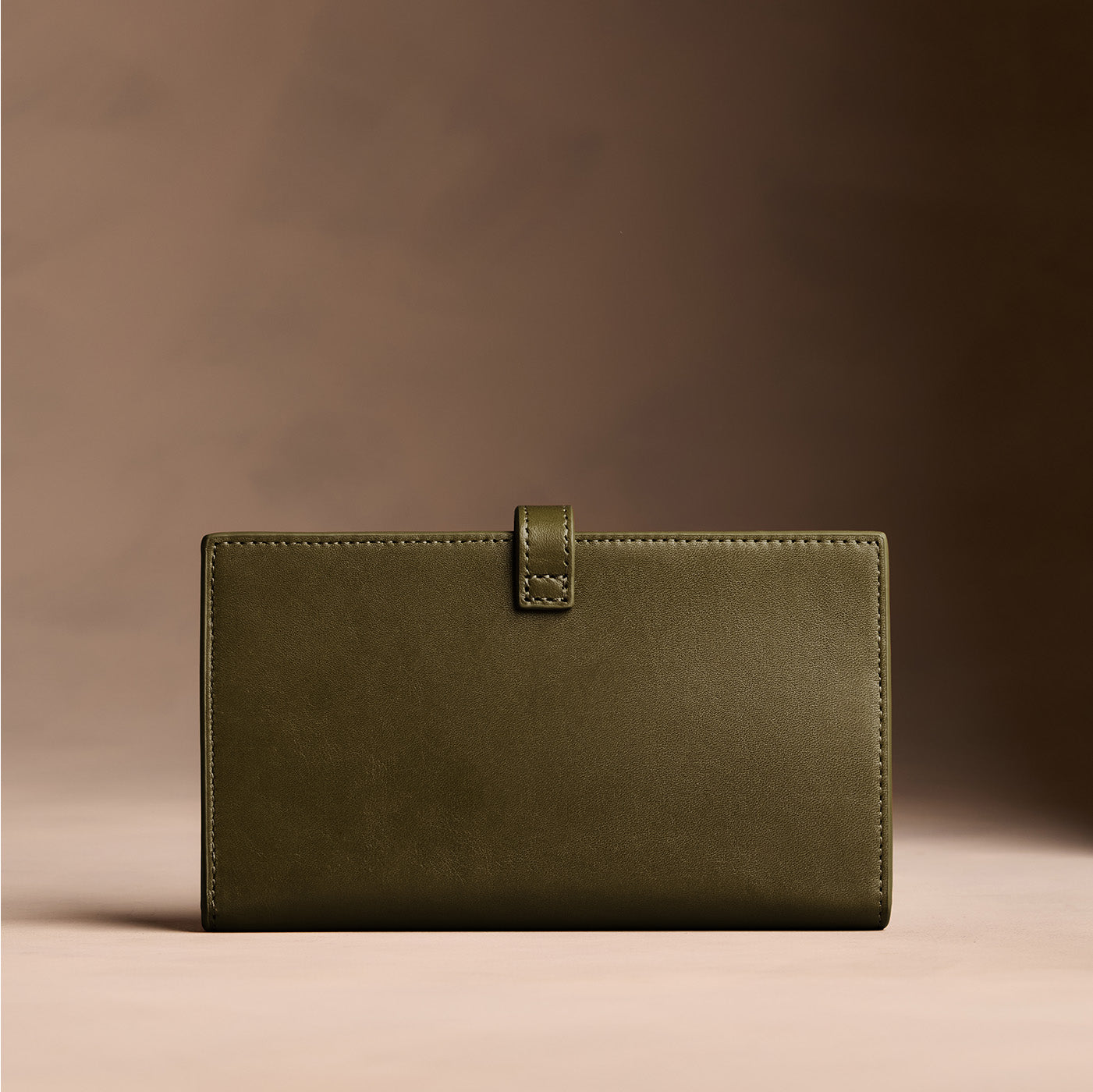 Bay Green*Extra Large | Leather bifold wallet with a strap and bar closure