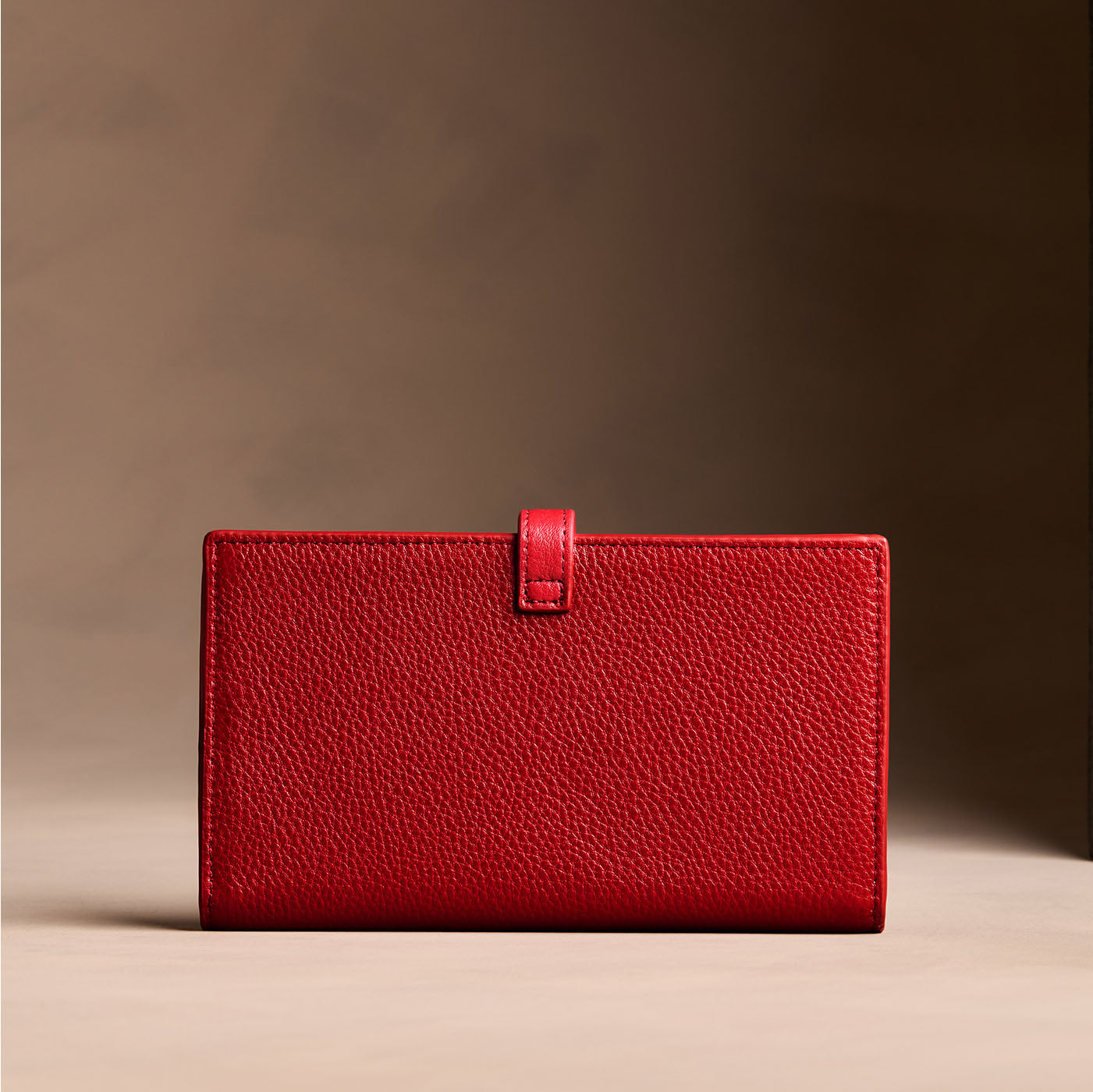 Icon Red*Extra Large | Leather bifold wallet with a strap and bar closure
