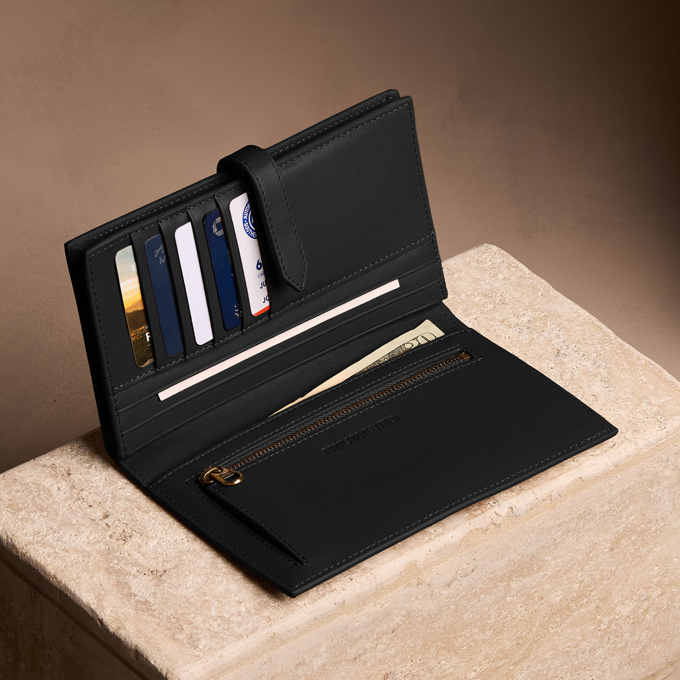 Onyx*Extra Large | Leather bifold wallet with a strap and bar closure