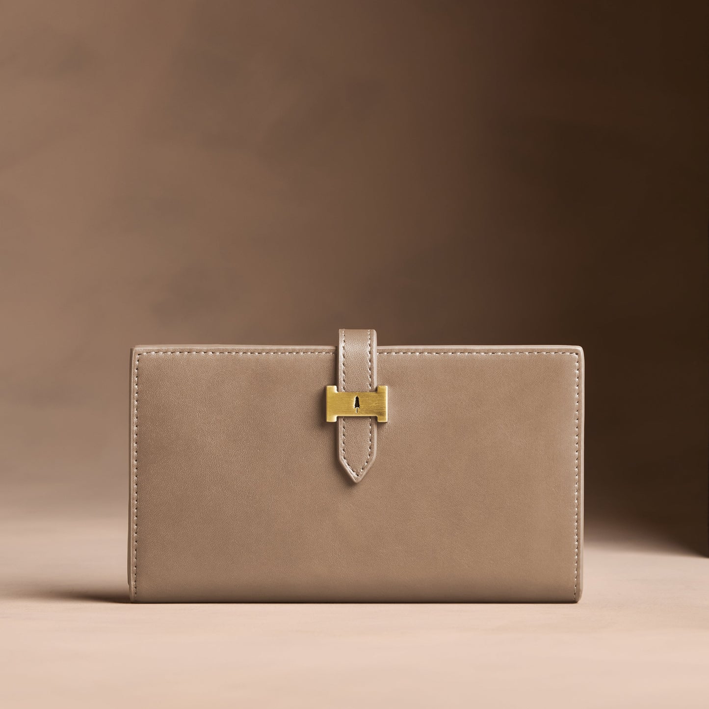 Satine*Extra Large | Leather bifold wallet with a strap and bar closure