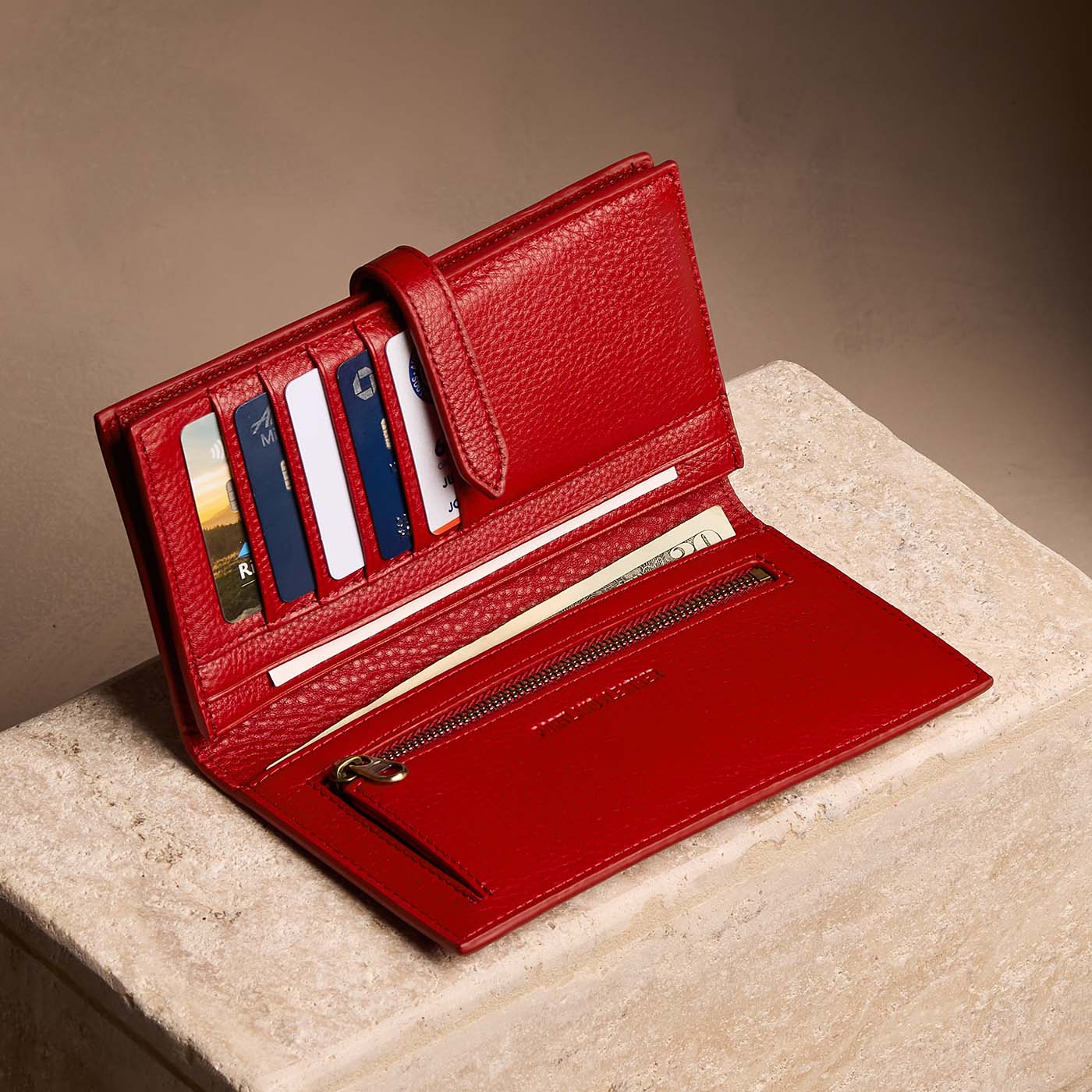 Icon Red*Large | Leather bifold wallet with a strap and bar closure
