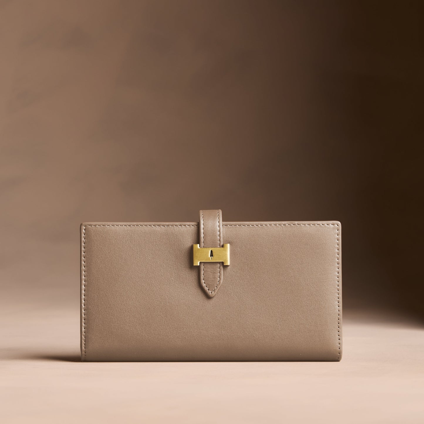 Satine*Large | Leather bifold wallet with a strap and bar closure