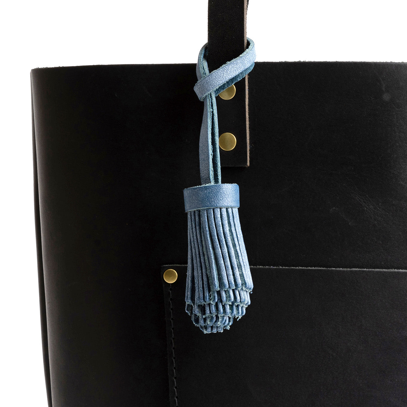 All Color: Indigo | Pom-pom style with tiered leather fringe