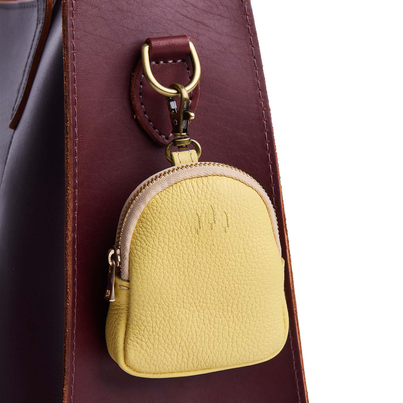 Butter Bliss | Leather keychain pouch with zipper top, swivel lobster clasp, and debossed emblem of three PLG trees