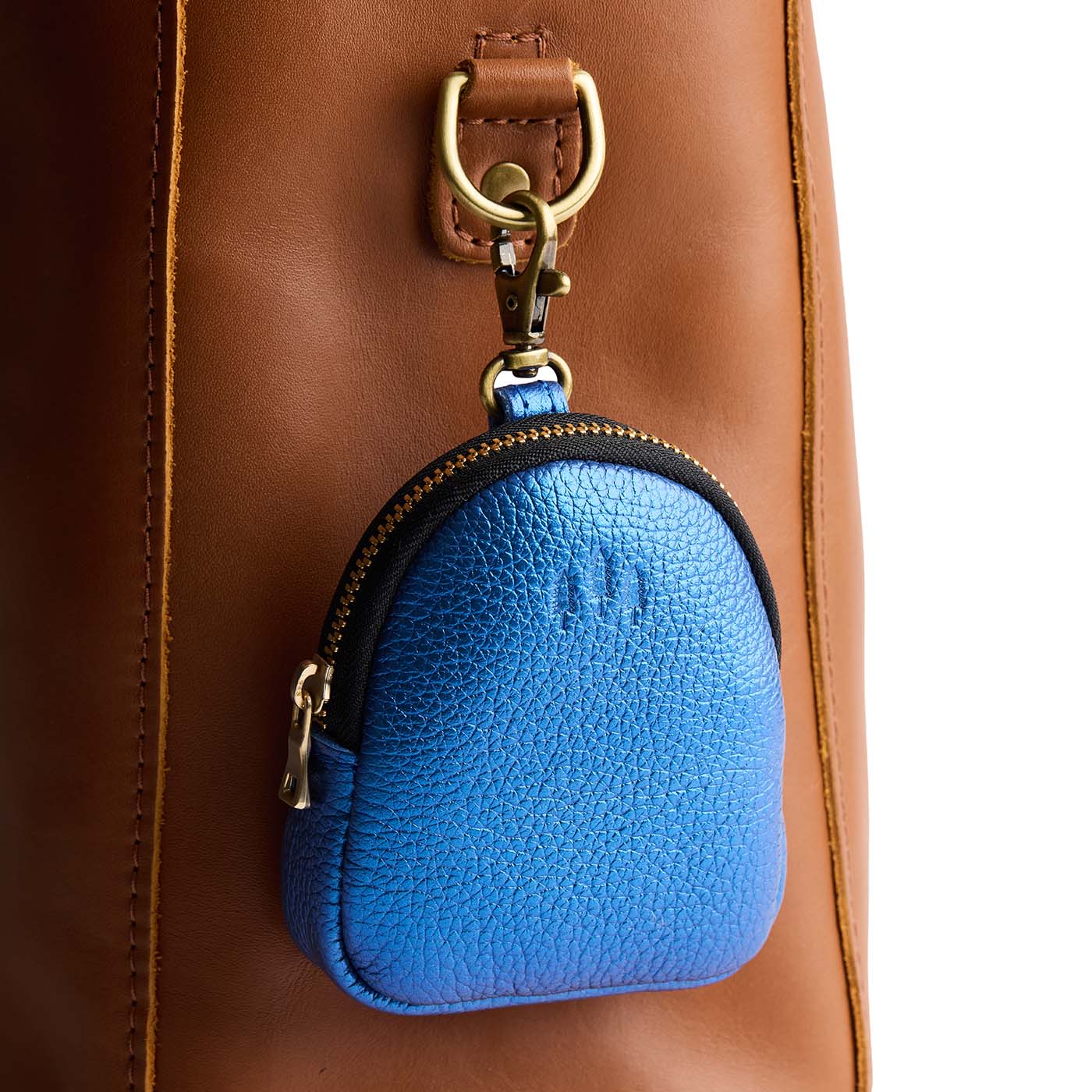 Comet Blue | Leather keychain pouch with zipper top, swivel lobster clasp, and debossed emblem of three PLG trees