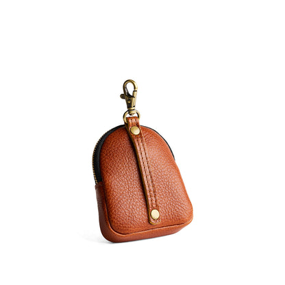 Sienna | Leather keychain pouch with zipper top, swivel lobster clasp, and debossed emblem of three PLG trees
