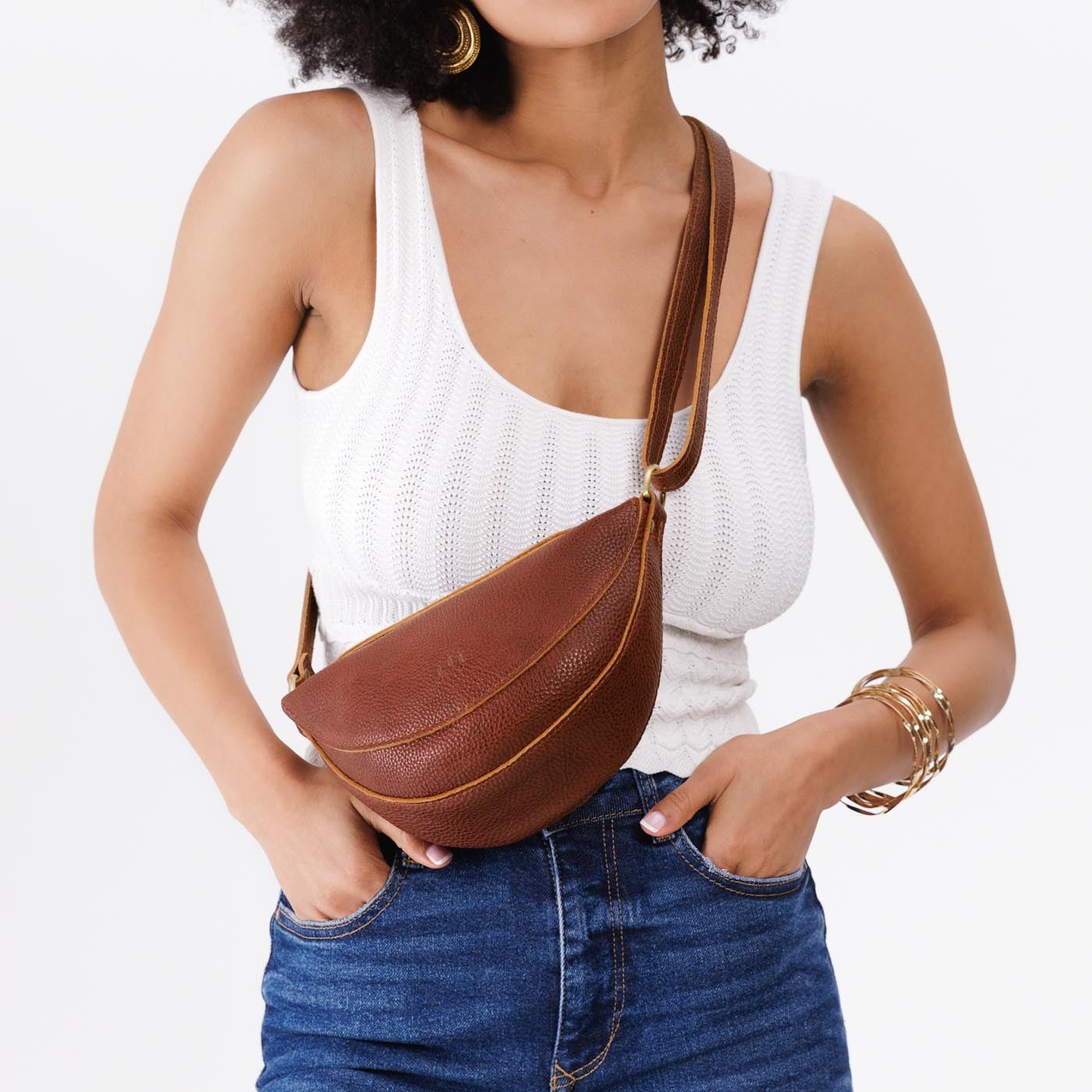 Nutmeg*Small | Model wearing petite half circle shaped sling bag