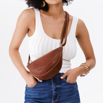 Nutmeg*Small | Model wearing petite half circle shaped sling bag