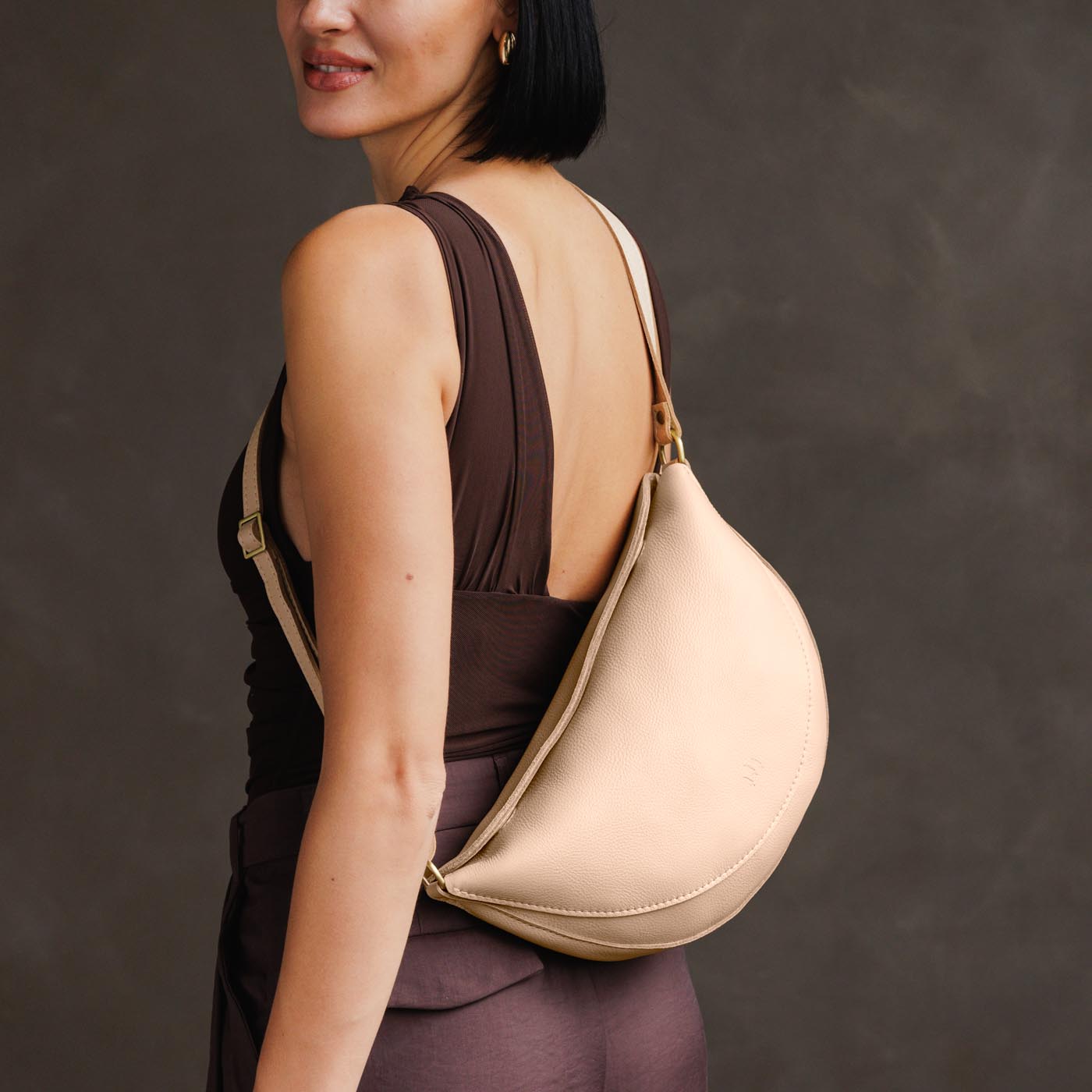 Moonflower*Large | Model wearing half circle shaped sling bag