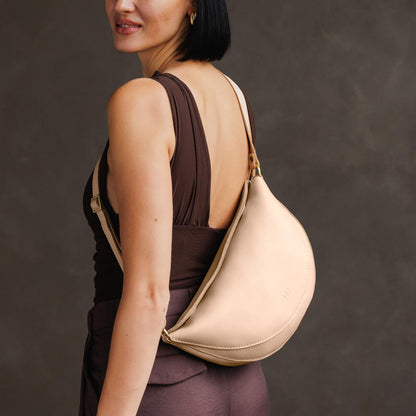Moonflower*Large | Model wearing half circle shaped sling bag
