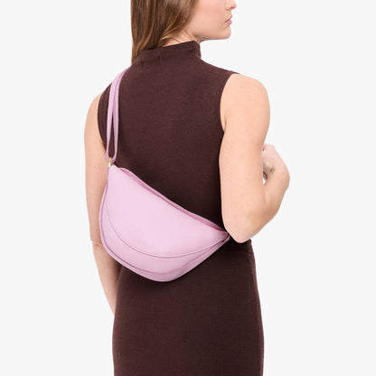 Pinkaboo*Medium | Model wearing half circle shaped sling bag