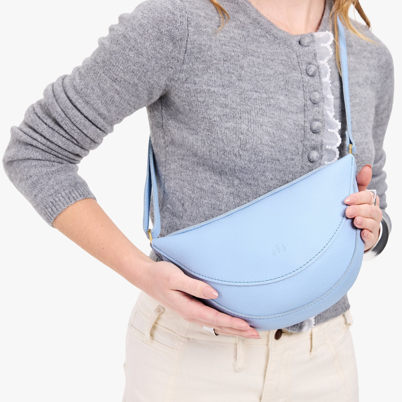 Skyway*Medium | Model wearing half circle shaped sling bag