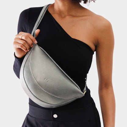 Stardust*Medium | Model wearing half circle shaped sling bag