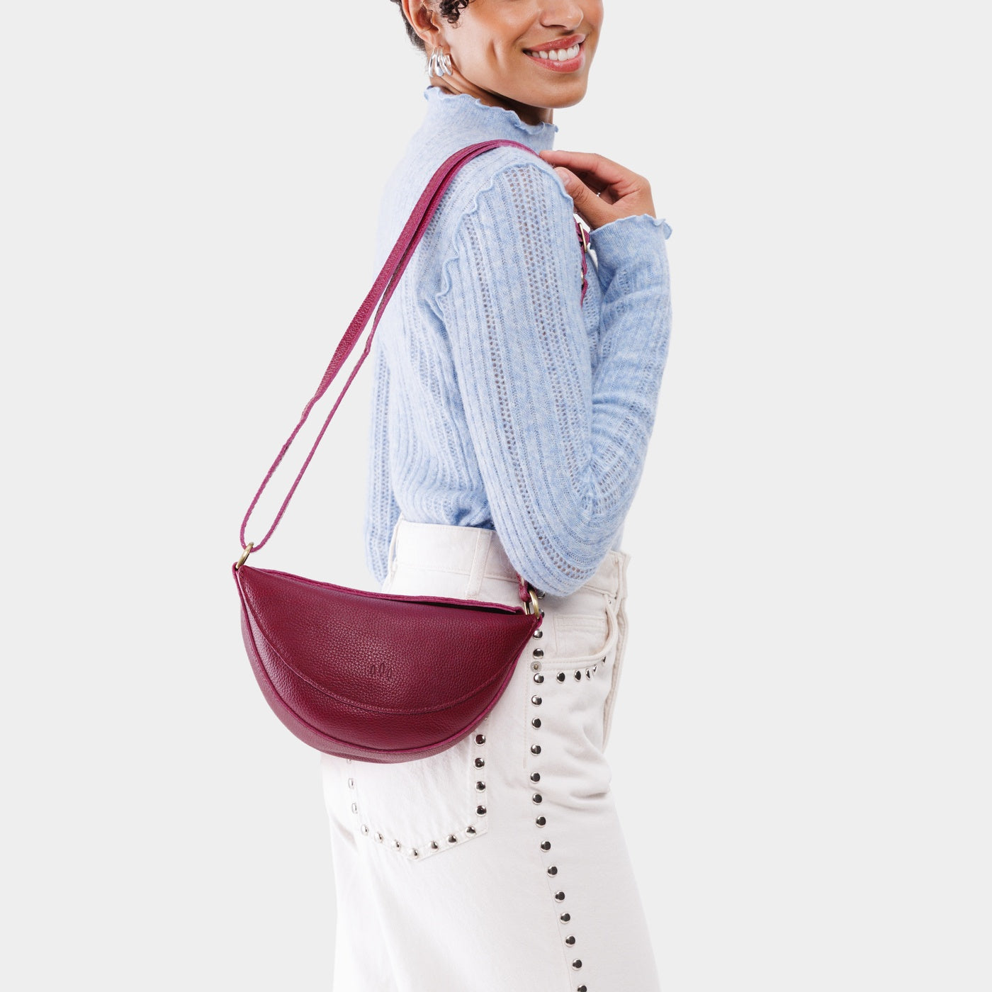 Orchid*Small | Model wearing half circle shaped sling bag