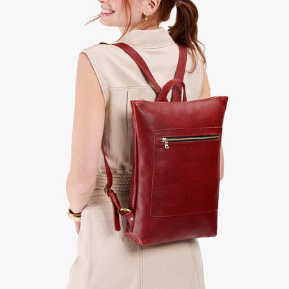 Chili Red | Model wearing rectangular slim leather laptop backpack
