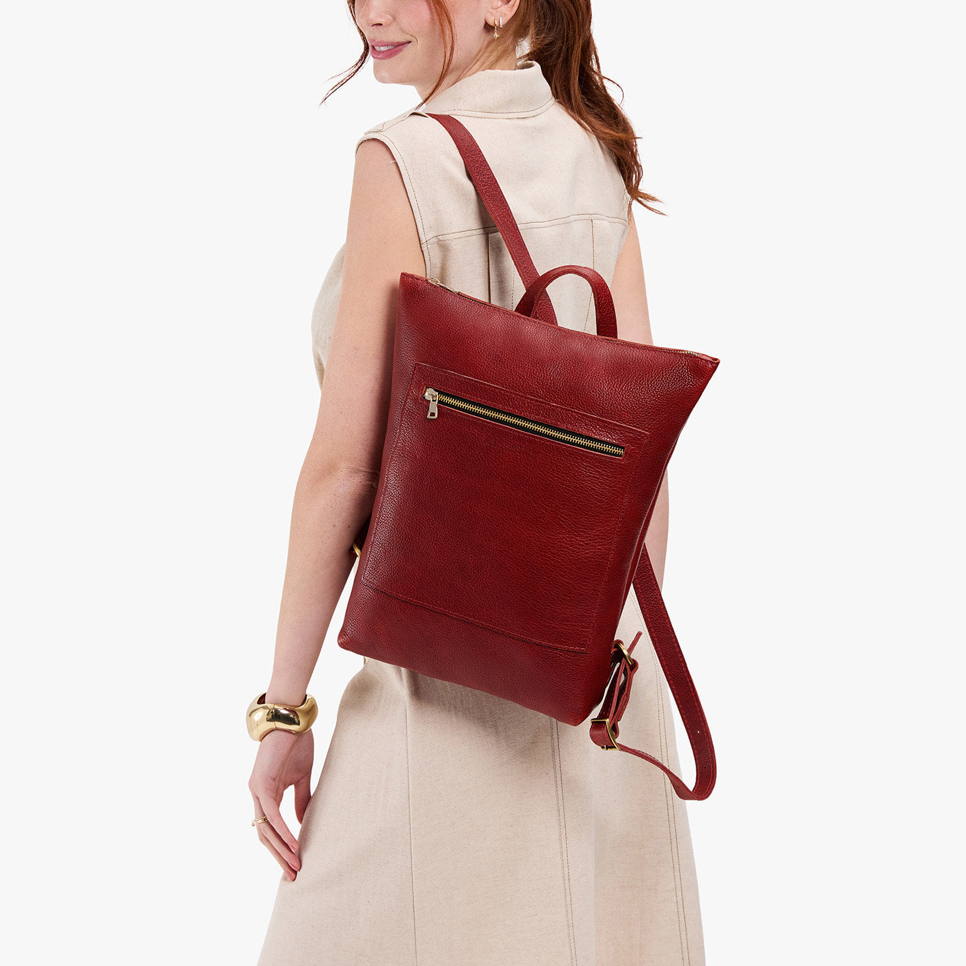 Chili Red | Model wearing rectangular slim leather laptop backpack