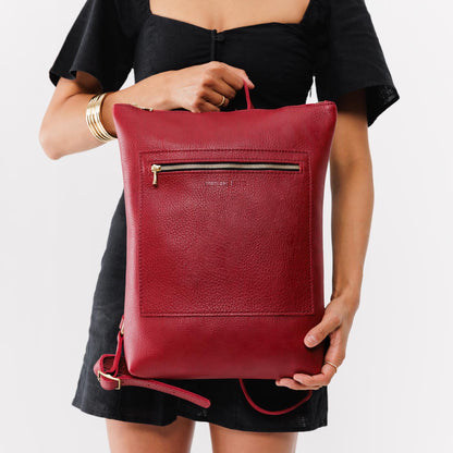 Flamenco | Model wearing rectangular slim leather laptop backpack